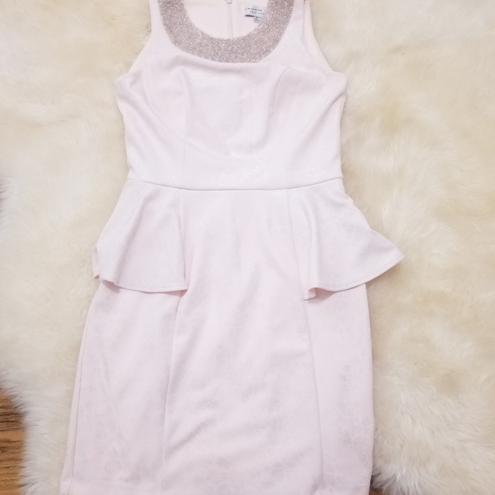 Blush leopard print peplum dress by Jackie Jon
